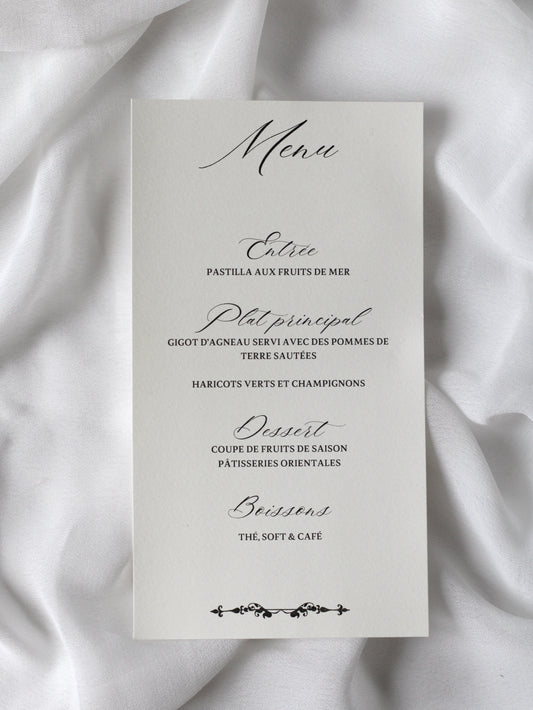 Menu de mariage personnalisé Collection CHARLOTTE au format rectangulaire avec design blanc épuré et petit motif décoratif en partie inférieure.